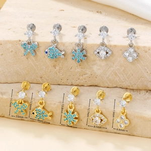 Detailed macro view showing micro-pave zircon butterfly and star piercing studs in gold and silver