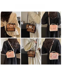 Detail shots showing vintage contrast color crossbody bag with butterfly metal ornament