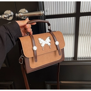 Retro contrast color crossbody bag with matte texture and silver butterfly buckle detail