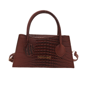 Dark brown trapezoid handbag with crocodile texture and gold FASHION & BAGS lettering