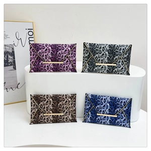 Leopard print envelope clutches in four colors with gold metal trim for women