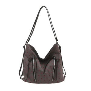Versatile dark grey hobo tote bag with red polka dots and dual-use shoulder straps