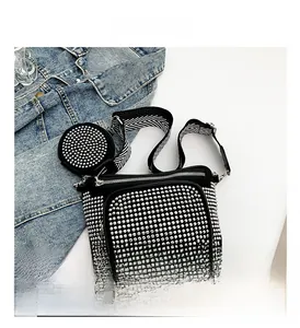 Detail of black PU crossbody bag with silver studs and matching round coin purse