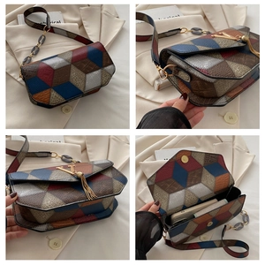 Detailed views of geometric color-block handbag with 3D cube pattern and gold V-clasp