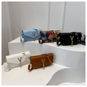 Chic women's crossbody bags in five colors with gold V logo and tassel pendants