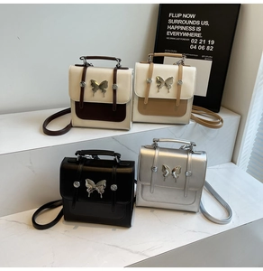 Collection of retro crossbody bags with metallic butterfly accents in four colors