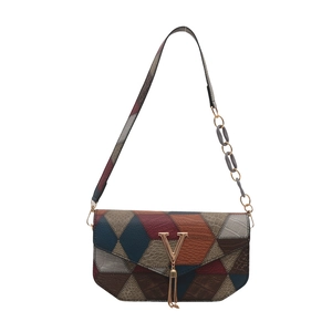 Women's chic contrast color leather crossbody bag with geometric design and V-logo metal tassel