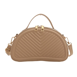 Chic beige semi-circle handbag with V-quilted faux leather and golden hardware