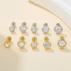 Elegant gold and silver heart and round stud earring set with sparkling zircons