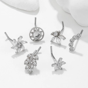 Set of six silver L-shaped stainless steel nose studs with sparkling zircon stones