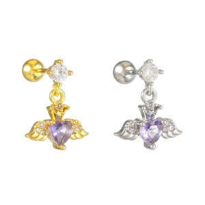 Detailed shot of heart wing cartilage studs with purple zircon in gold and silver finish