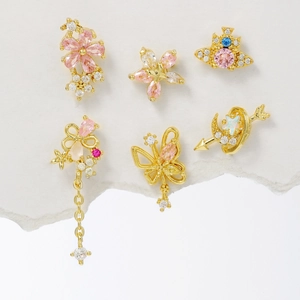 Set of six gold-plated stud earrings with pink zircon butterfly and Saturn pendant