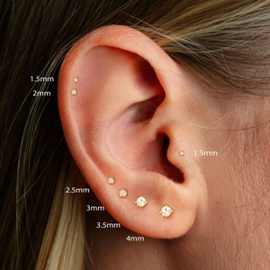 Gold stud earrings with 4-prong set cubic zirconia in sizes from 1.5mm to 4mm