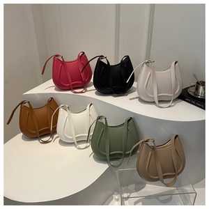 Minimalist half-moon underarm shoulder bag in seven colors with horseshoe stitch detail