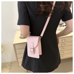 Light pink faux leather mini crossbody phone bag with adjustable strap and buckle