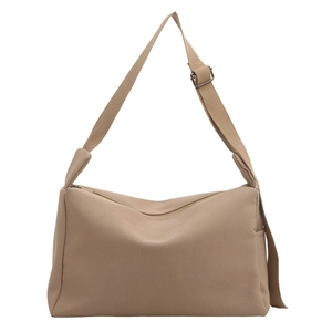 Khaki nylon tote bag with adjustable strap and zipper closure in a minimalist casual style