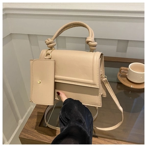 Fashionable beige small square handbag with knot handle and matching coin purse set