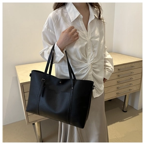 Minimalist large black PU leather tote bag with functional exterior pocket for women