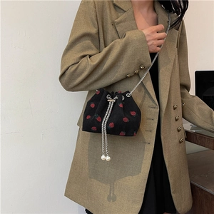 Black corduroy bucket bag with strawberry patterns, pearl accents and silver chain strap