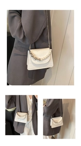 Détail du sac blanc texture crocodile avec anse en perles et accents argentés