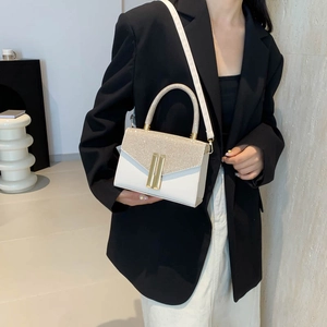 Elegant white leather crossbody bag with sparkling sequins and gold handle for women