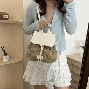 Straw and white leather backpack for women with drawstring and magnetic closure flap