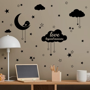 Détail de stickers muraux lune et étoiles avec texte Love Beyond Measure pour la chambre