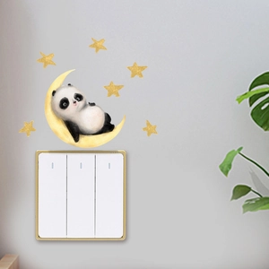 Luminous wall sticker with panda on moon and stars above a white light switch decor