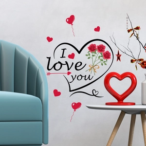Detail view of heart wall decal with red roses and I love you text on white wall