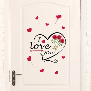 Detail of red rose and heart wall sticker with I love you text on white door