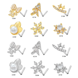 Collection of 12 stainless steel L-shaped nose studs with zircon and pearl accents