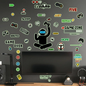 Luminous pixel art game wall stickers glowing in the dark with controller and game zone icons