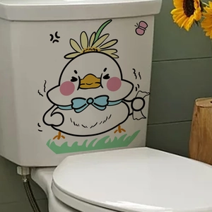 Detail of cartoon chick toilet sticker with sunflower and blue bow for bathroom decor