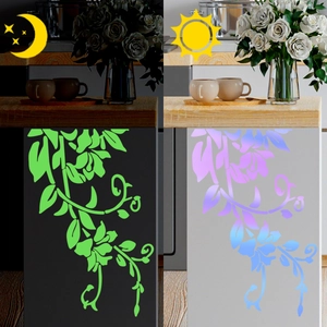 Glow-in-the-dark floral vine wall stickers showing day and night color change effects