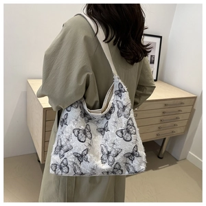 Minimalist white tote bag with black butterfly embroidery and large capacity