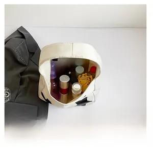 Internal view of a white star tote bag showing large capacity for umbrellas and tablets