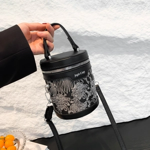 New Chinese style cylinder bag with white embroidery and top handle in black PU leather