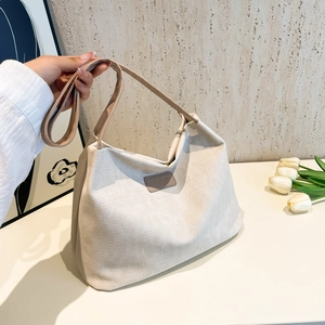 Sac fourre-tout élégant en toile blanc cassé avec anses en cuir marron chic
