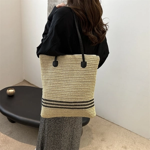 Japanese style striped straw bucket bag with black leather straps for summer beach