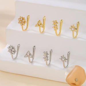 U-shaped star and snowflake non-pierced nose cuffs set in 18k gold and silver plating