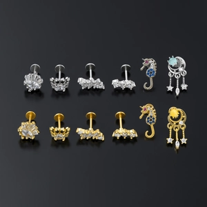 Flower and sea life themed stainless steel labrets with zircon stones in gold and silver