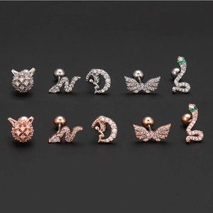 Set of angel wing and moon fairy ear cartilage studs with cubic zirconia in silver and rose gold