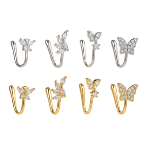 Set of eight gold and silver butterfly and leaf non-pierced nose cuffs with zircons