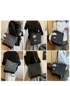 Details of large capacity checkered tote bag with plush cloud charm and metal bow