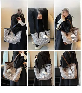 Detail view of large tote bags with traditional wave patterns and plush charms