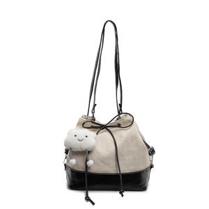 Canvas bucket backpack with black leather base and cute cloud plush charm