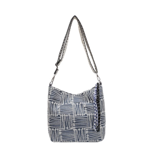 Blue and white striped canvas tote bag with woven fringe tassel and patterned shoulder strap