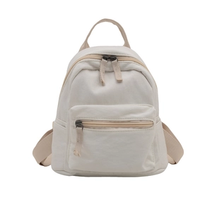 Minimalist beige nylon small backpack with front pocket and adjustable straps for women