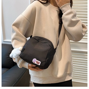 Large capacity black nylon crossbody bag with purple mushroom embroidery and adjustable strap