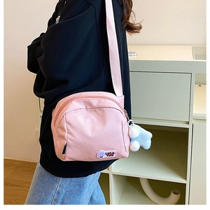 Pink nylon crossbody shell bag with lucky embroidery and cute bear pendant charm